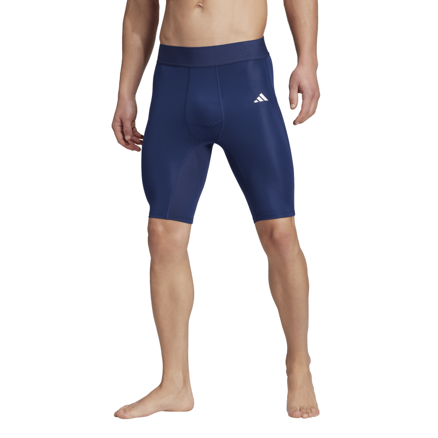 Elasťáky Adidas Techfit tm.modré Velikost: M