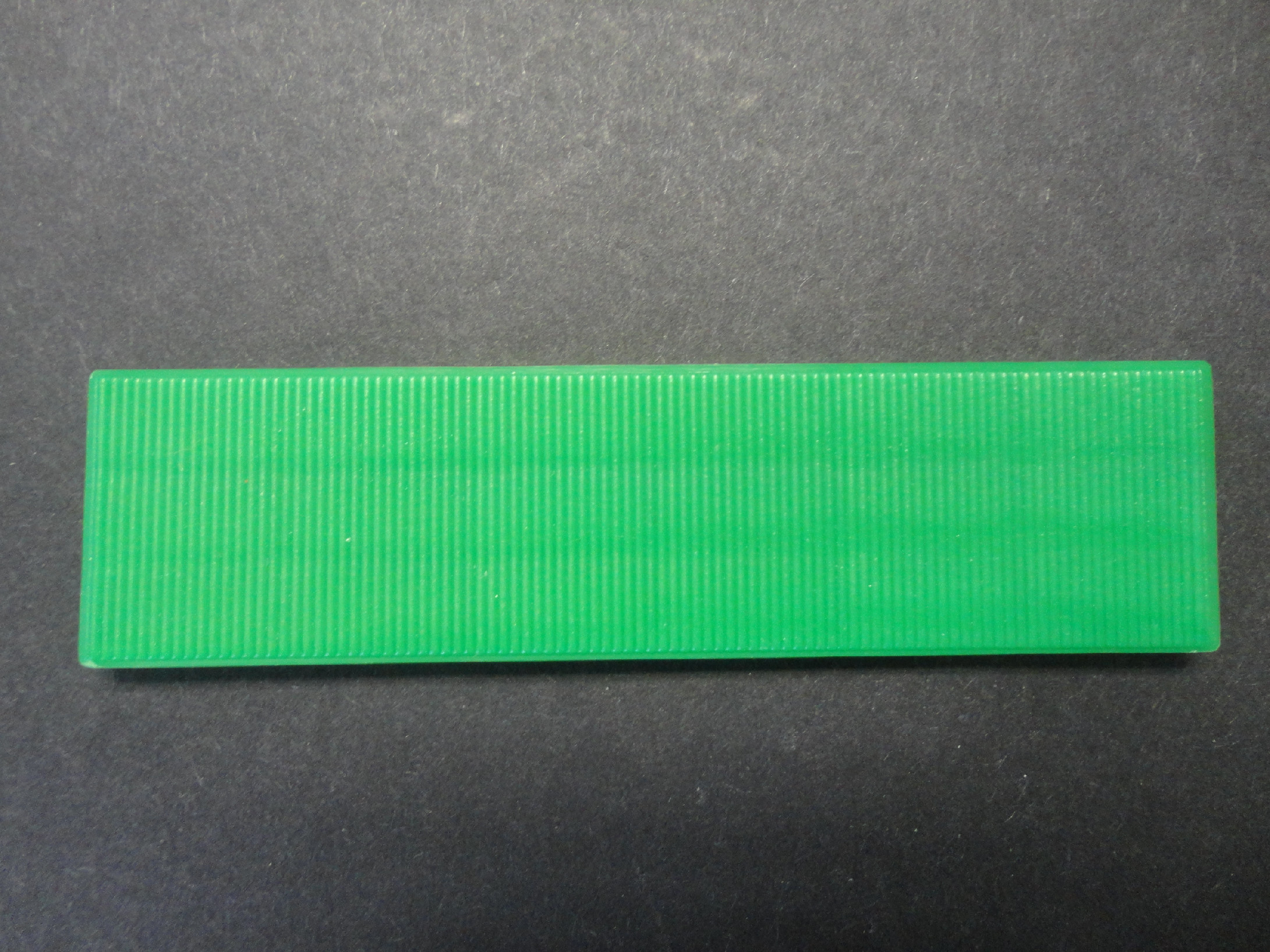Vymezovací plastová podložka Barva: Zelená, Rozměr: 26mm x 100mm, Tloušťka: 4mm