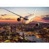Letadlo nad městem shutterstock 630647564