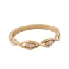 Zapletený zlatý prsten se zirkony