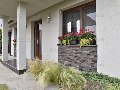 Stone wall cladding Andesite Gray-Brown on modern house entrance combining gray and brown tones for natural contrast.