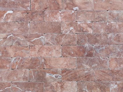 Stone wall cladding Travertine Red sample with natural reddish tones and subtle veins, showing smooth surface and rectangular pattern.