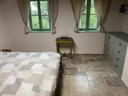 Floor tiles for living room Travertine Silver French pattern shown in detail view with smooth natural surface.