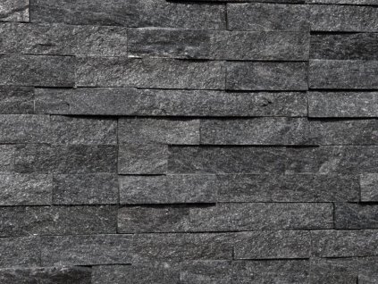 Wall detail of natural stone cladding Quartzite Black Pearl pane