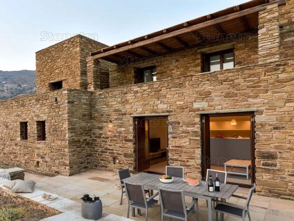House facade with natural stone cladding Quartzite Shira rock face