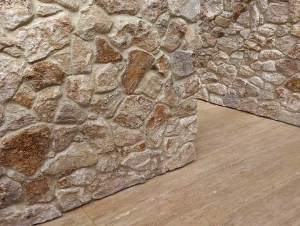 Rustic interior wall cladding with natural stone Travertine Mandre rock face