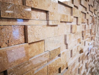 Close-up of 3D stepped travertine mosaic with glossy finish — Travertine Betula Noche polished wall cladding.