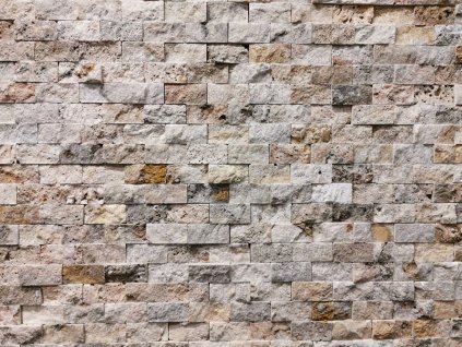 Textured wall surface from Travertine Scabos mosaic, 2.5×5 cm split face natural stone.