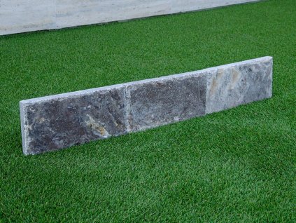 Silver-grey natural stone border with hand-chiselled edge for refined finishes — Curbstone Travertine Silver, chiselled edge.