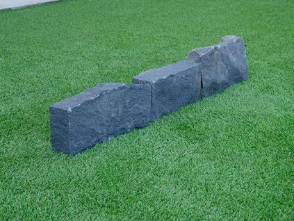 Robust natural stone border with rustic split face for paths and garden edges — Curbstone Basalt, split.