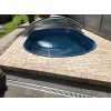 Pool pavers using Travertine Classic surrounding a small garden spa for a safe, non-slip edge.