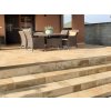 Stone floor in Travertine Classic French pattern forming broad outdoor steps.