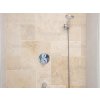 Bathroom tiles in Travertine Classic French pattern shown as a warm shower surround.