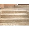 Stone floor tiles Travertine Classic are installed on exterior stairs with a smooth travertine finish.