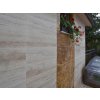 Stone walStone wall tiles Travertine Classic VC highlight the natural travertine texture on an exterior wall.
