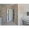 Bathroom tiles Marble Pearl Cream create a luxurious and elegant feel with polished marble surfaces.