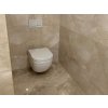 Stone wall tiles Marble Light Emperador enhance bathroom interiors with warm tones and a glossy marble surface.