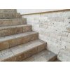 Stone wall cladding Travertine Classic split face enhances outdoor stairs with soft creamy travertine tones.