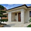 House facade cladding made of Travertine Classic split face 8 cm natural stone tiles
