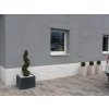 Ledge stone Marble Crystal White split face brightens a modern house facade with elegant light marble surface.