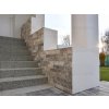 Stacked stone Travertine Silver split face decorates a stair wall with elegant silver-grey tones.