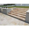 Paving garden slabs with Travertine Classic French pattern used on outdoor garden steps, side perspective.