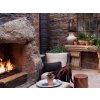 Interior stone cladding Slate Skalitz adds a natural rustic look around a cozy fireplace.
