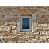 Veneer rock wall Limestone Nadri rock face shows the rustic natural texture of limestone used for exterior siding.