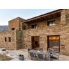 House facade with natural stone cladding Quartzite Shira rock face