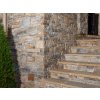 Stone facade Sandstone Castle Cladding rock face decorates entrance stairs with elegant sandstone texture and timeless look.