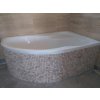 Bathroom mosaic tiles in Travertine Classic add a warm natural stone look around the bathtub.