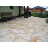 Flagstone paving Limestone terrace in light beige color with natural irregular pattern and smooth surface.