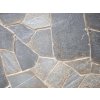 Crazy paving Quartzite Graphite floor with irregular dark slabs creating elegant outdoor stone design.