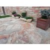Crazy paving Gneiss Yellow used for terrace and patio with irregular yellow stone pattern.