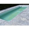 Patio stone pavers — Marble Dolphin 61×40.6×3 cm used at the pool edge with linear drain detail.