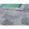 Pool deck pavers in Marble Dolphin 61×40.6×3 cm, close-up of the grey stone surround by the pool.