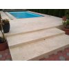 Patio stone pavers in Marble Saturn, close view of wide terrace steps and platform.
