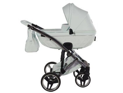 Side profile of Junama Candy Premium Mint stroller showcasing mint finish