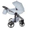 Elegant side profile of Junama Enzo Blue stroller in soft beige finish