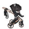 Junama Hearts Black Cooper stroller canopy protecting baby from sun and wind