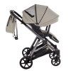 Junama Space V3 Green stroller canopy protecting baby from sun and wind