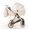 Junama Ellegante Lame Beige stroller canopy protecting baby from sun and wind