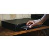 NAD C 589 Left Above with hand and CD 90fbdbf6 ea35 4964 8ae1 6884cc05ff58 2000x