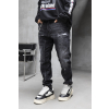Černé slim fit džíny s distressed efektem Noir