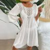 Bílé krajkové plážové šaty