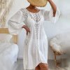 Bílé krajkové plážové šaty