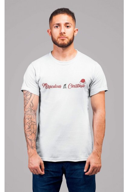 t shirt mockup of a redhead man with tattoos standing in a studio 22340