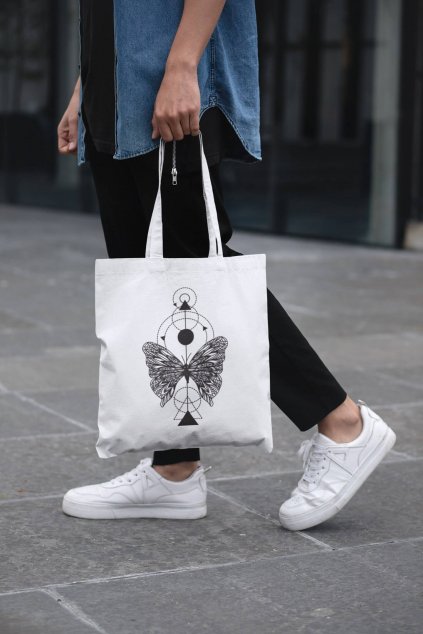cropped face mockup of a man holding a tote bag in the street 29424 (9)