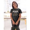 portrait of an elder woman wearing a t shirt mockup holding a bag a20358 (3)