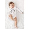 long sleeve onesie mockup of a happy baby lying over a soft cloth m978 (1) (1)